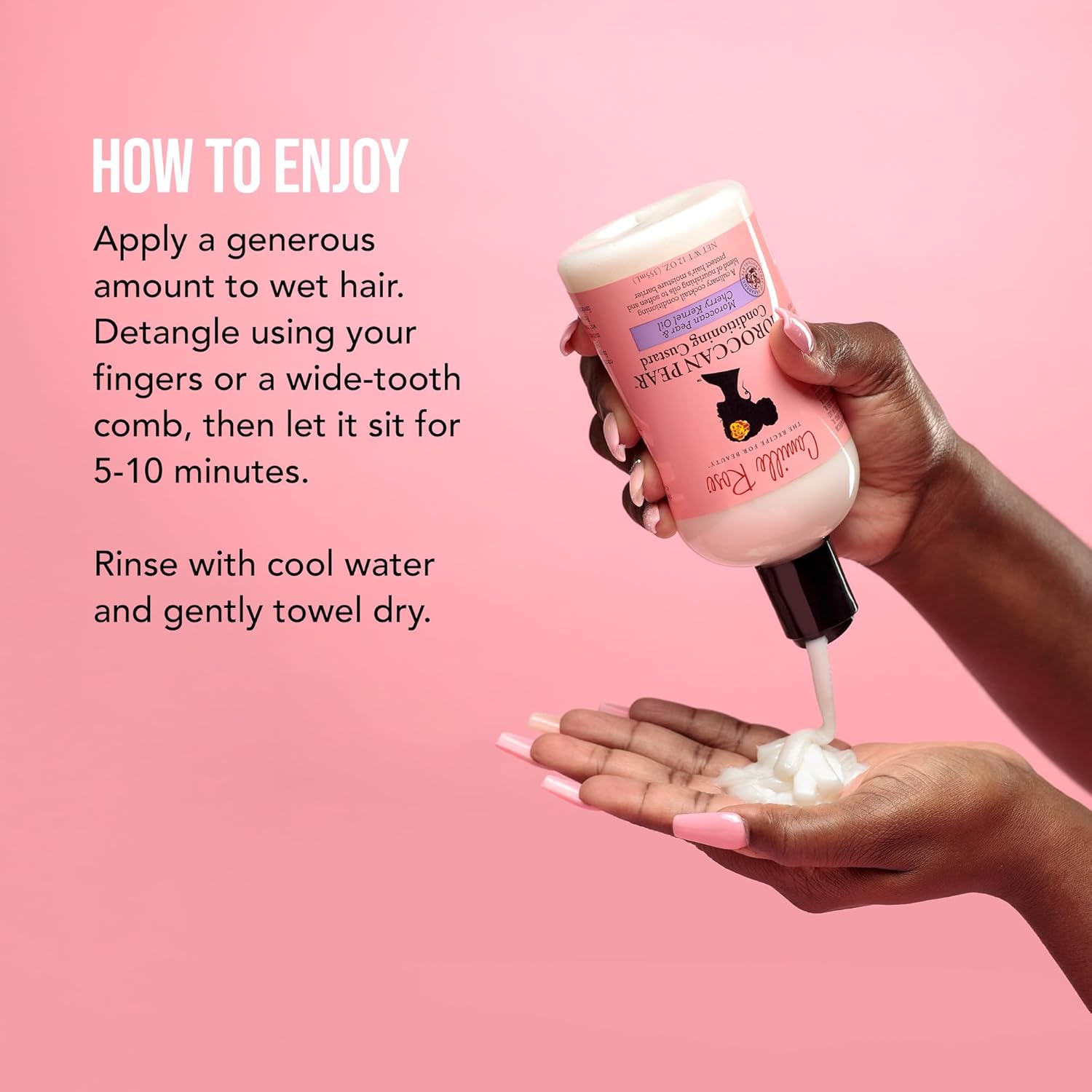 Woman applying Moroccan Pear Hair Custard Hydrating Curl Conditioner to curly hair